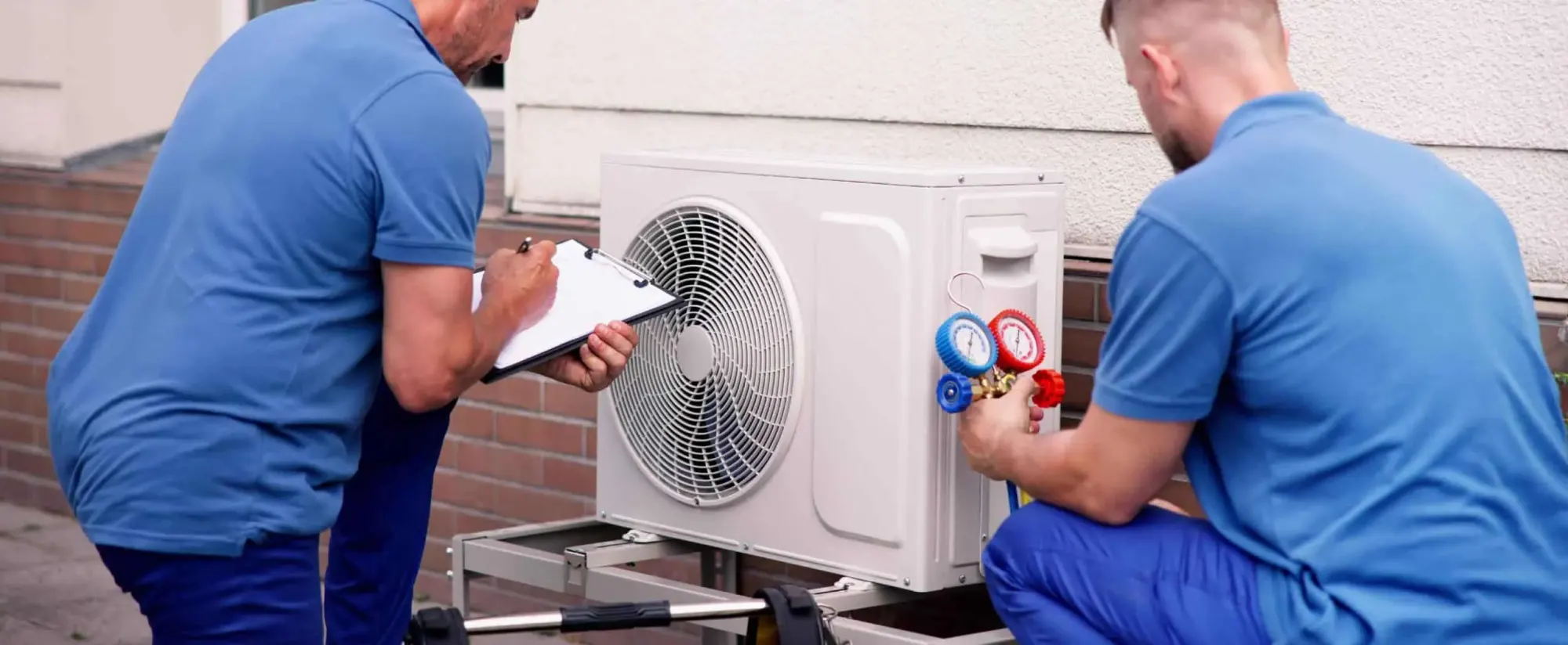 Technician servicing a residential heat pump in Rancho Cucamonga, CA Technician servicing a residential heat pump in Rancho Cucamonga, CA